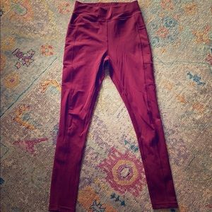 Deep burgundy leggings with side pockets